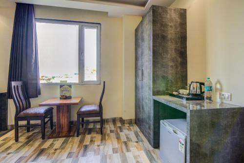 Hotel Smart Plaza By SMART GROUPにあるキッチンまたは簡易キッチン