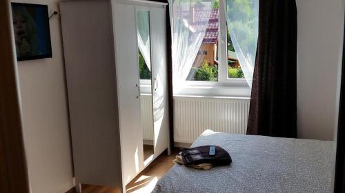 Postel nebo postele na pokoji v ubytování Pension Klarissa