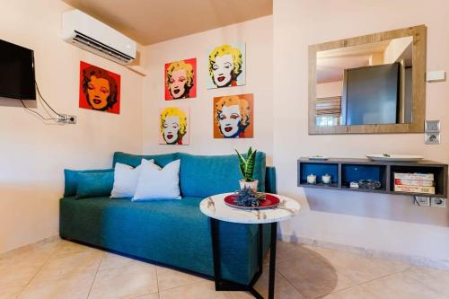 A television and/or entertainment centre at Urban Living, Minicasa Nomad - Kalamata's Hideaway