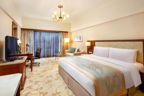 TV a/nebo společenská místnost v ubytování Shangri-La Beihai