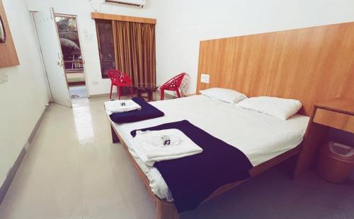 Krevet ili kreveti u jedinici u okviru objekta Samara Sea View Resort