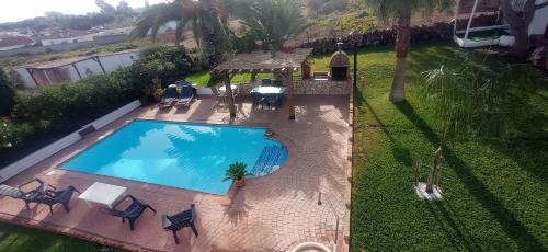 an overhead view of a swimming pool in a yard at La Luciérnaga in Chiclana de la Frontera