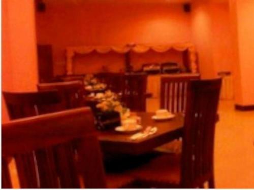 A restaurant or other place to eat at Abadi Hotel Sarolangun by Tritama Hospitality