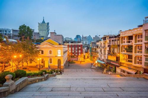 a view of a street in a city at dusk at Man Va Hotel in Macau