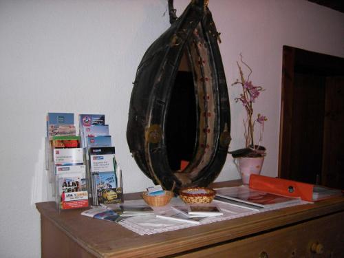 a table with a mirror on top of a dresser at Prantl Roswitha in Sölden