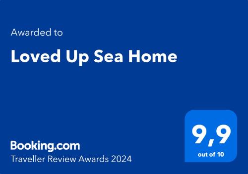 Certifikát, ocenenie alebo iný dokument vystavený v ubytovaní Loved Up Sea Home