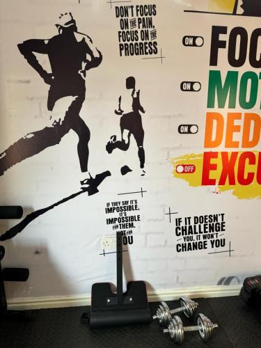 a wall with a mural of a man on a skateboard at Dominance Events and Suites in Ibadan