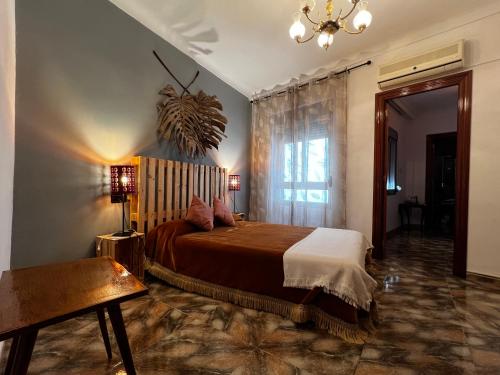 Posteľ alebo postele v izbe v ubytovaní Las Parras House - ViviendaRural en Torredelcampo