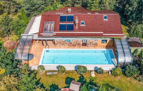an overhead view of a house with a swimming pool at Amazing Home In Mechowo With Sauna in Mechowo
