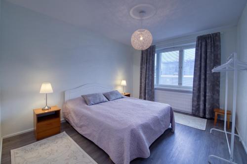 Postel nebo postele na pokoji v ubytování Tampereen kunkku