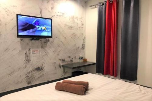 TV a/nebo společenská místnost v ubytování Hotel Ventura