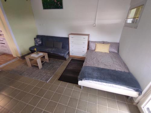 Postel nebo postele na pokoji v ubytování APARTMA ZADNIKAR
