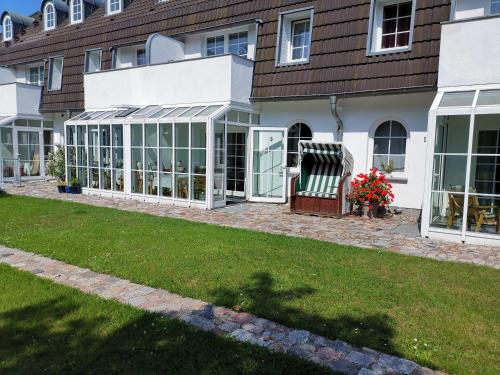 Κήπος έξω από το Fewo Freya in der Ostseeresidenz Gendarm