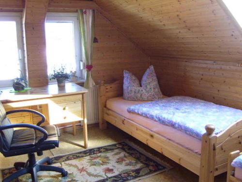 Voodi või voodid majutusasutuse Ferienwohnung Am Heidesee toas