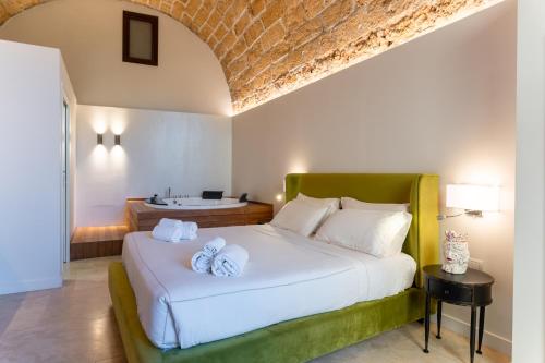 Chambre Lit King-Size avec Baignoire Spa