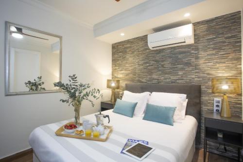 Ένα ή περισσότερα κρεβάτια σε δωμάτιο στο SingularStays Xativa III