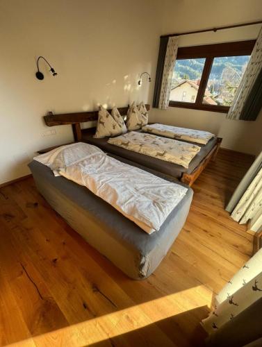 Ένα ή περισσότερα κρεβάτια σε δωμάτιο στο Ferienhaus Karlchen
