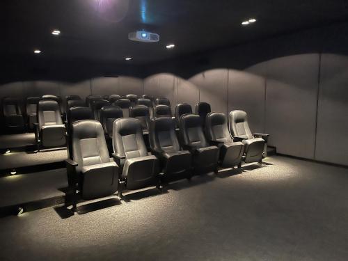 a group of empty chairs in a room at Punta del Este - Green Life - Top amenities in Punta del Este