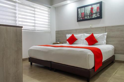 Postel nebo postele na pokoji v ubytování Waira Suites