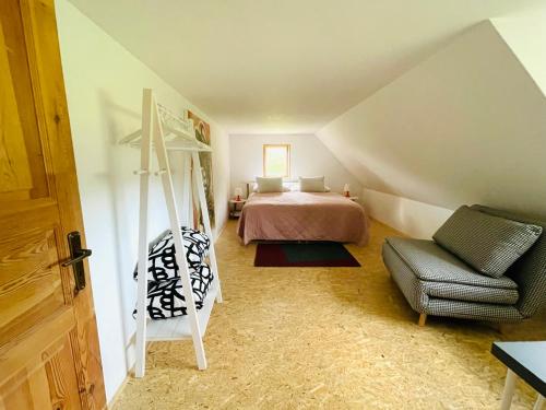 Postel nebo postele na pokoji v ubytování Kaménka 8 - Farmářův dům