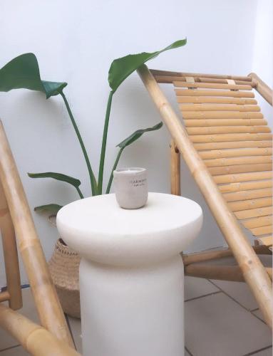 a bathroom with a toilet and a plant at Katoi traditional house in Éxo Khóra