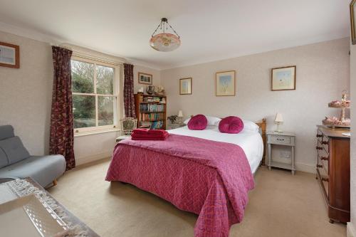Cama ou camas em um quarto em Lilac Cottage