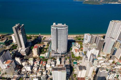 an aerial view of a city with tall buildings at Moonlight Bay Panorama Condotel Ocean View in Nha Trang