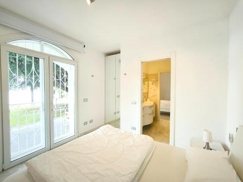 Ένα ή περισσότερα κρεβάτια σε δωμάτιο στο Casa Blanca