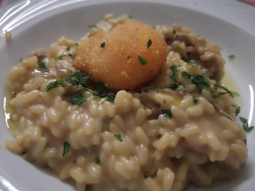 a plate of macaroni and cheeseottage with a small pinch ofmoilmoil at Hotel Atlantic in Gatteo a Mare