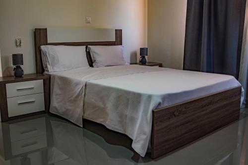 Łóżko lub łóżka w pokoju w obiekcie Hotel Vitoria