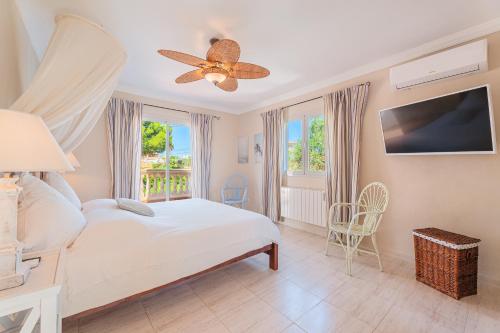 Postel nebo postele na pokoji v ubytování Casa Son Moja