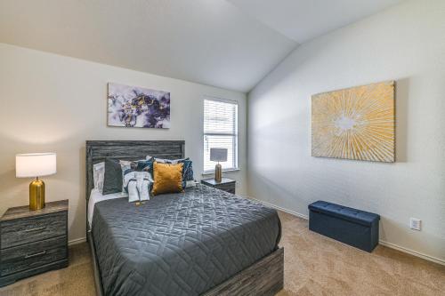 a bedroom with a bed and a window at McKinney Home with Smart TV 10 Mi to Historic Dwtn! in Frisco