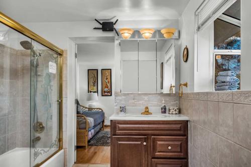 a bathroom with a sink and a shower at Secret Stairs Studio #1 in Los Angeles