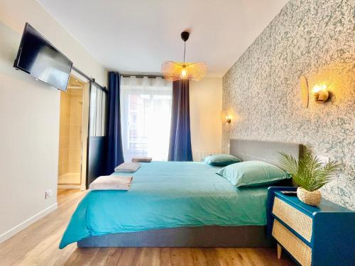 Postel nebo postele na pokoji v ubytování Appartements à Lorient - Tout confort - Internet Fibre - NOUVEAU