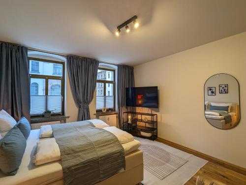 Postel nebo postele na pokoji v ubytování Royal Apart Chemnitz 1 - Terrasse nahe Zeisigwald