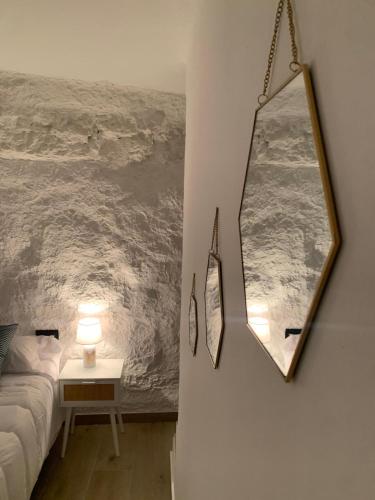 Una cama o camas en una habitación de ALOJAMIENTOS EL FARO DEL JÚCAR