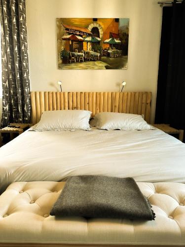 L'Hermine Chambres d'Hôtesにあるベッド