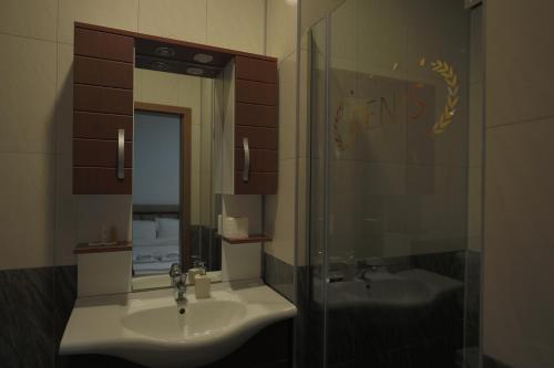 Koupelna v ubytování Hotel Denis