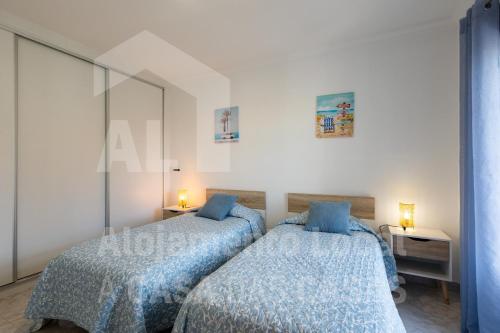 Ένα ή περισσότερα κρεβάτια σε δωμάτιο στο Casa Sardine by ACasaDasCasas