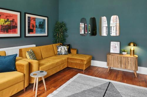 a living room with a couch and a table at Host & Stay - The Georgian Quarters at Falkner Street in Liverpool