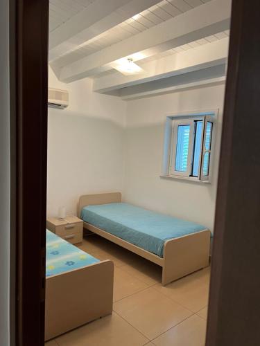 Ένα ή περισσότερα κρεβάτια σε δωμάτιο στο Juice aparthotel - Diamante