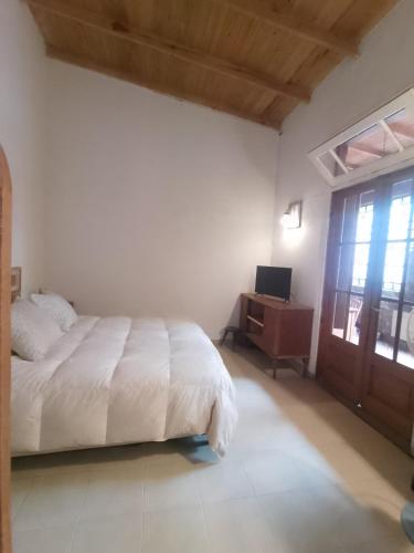 Postel nebo postele na pokoji v ubytování Casa Brandsen II