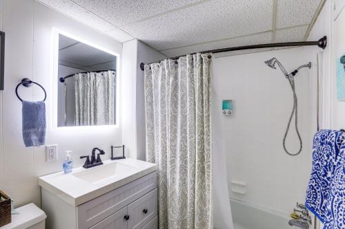 a bathroom with a sink and a shower at Private Hot Tub Cabin 1 Mi to Beech Mountain! in Beech Mountain
