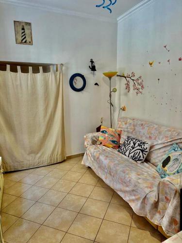 Postel nebo postele na pokoji v ubytování La casetta del Pescatore