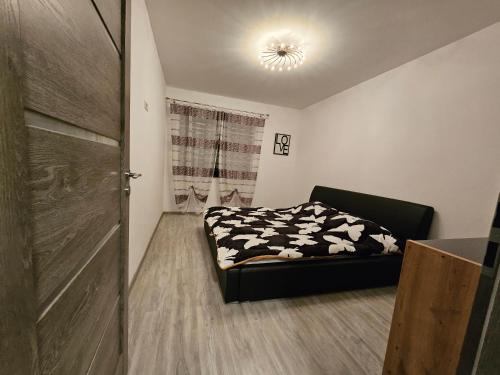 Ένα ή περισσότερα κρεβάτια σε δωμάτιο στο M' Apartament 2