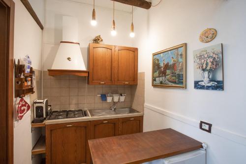 Una cocina o zona de cocina en BeB Nonno Baffo