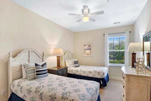 Llit o llits en una habitació de Windward Point # 109