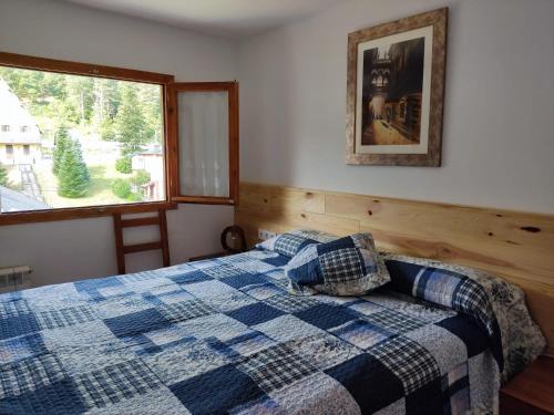 Postel nebo postele na pokoji v ubytování apartamento dúplex en la Molina