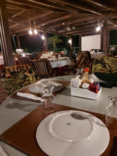 A restaurant or other place to eat at Gran Lençóis Flat Barreirinhas