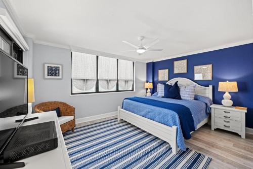 מיטה או מיטות בחדר ב-Arcadian One 16b